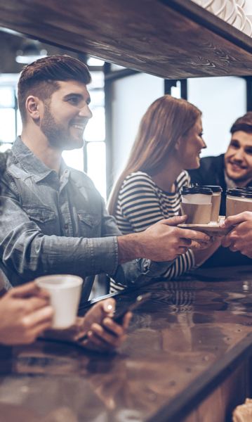 Full-color view of friends at a coffee bar