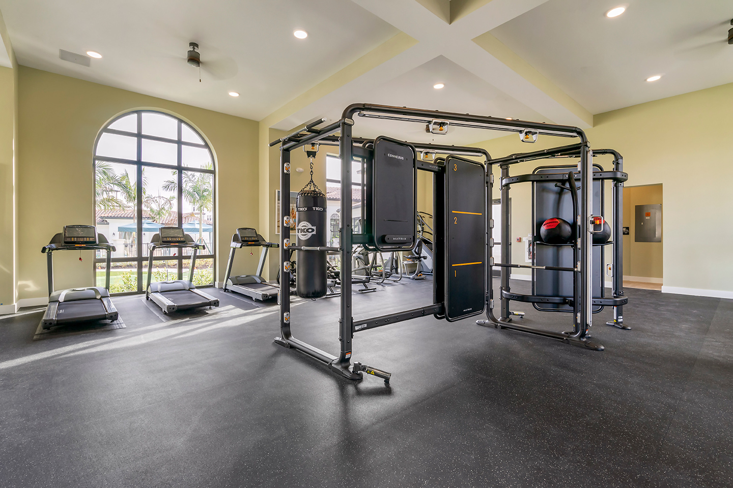 Community fitness center with cardio machines and strength training equipment