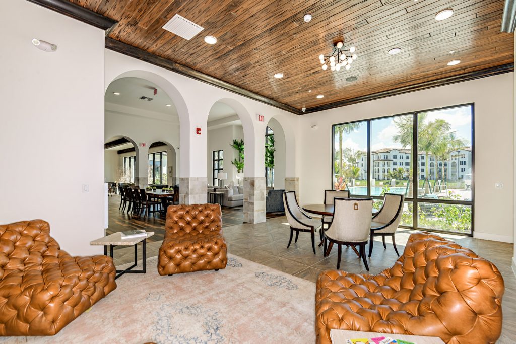 Library area with lounge seating and floor to ceiling windows